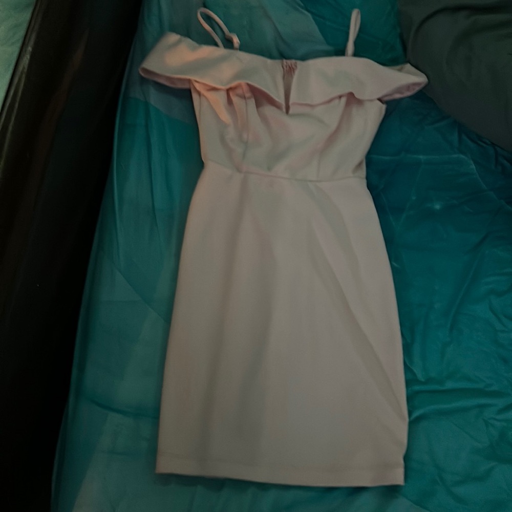is from Bsmart it has never been worn but once and fits all your curves nicely